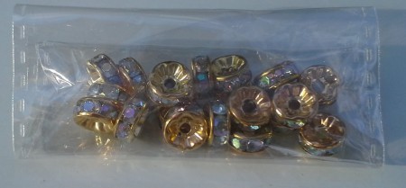 * artnr. rop1,13ab AB lyster. Guld/vit cristal rondeller. 8mm. 