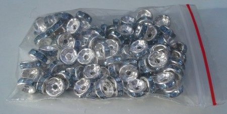 * artnr. rop2,8.1 Silver/ljusblå crystal rondeller. 8x3mm. 
