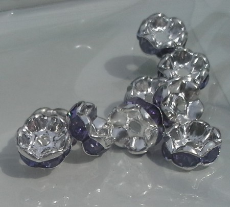 * artnr rop2,10.2 Rondeller 8x3mm. Färg se bild