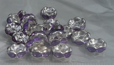 * artnr rop2,10 Rondeller 8x3mm. Färg se bild