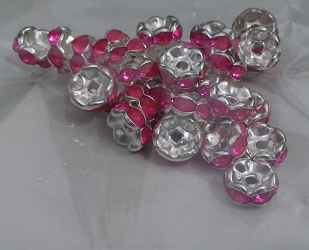 * artnr rop2,12 Rondeller 8x3mm. Färg se bild