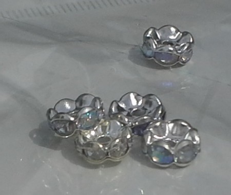 * artnr rop2,13 Rondeller 8x3mm. Färg se bild