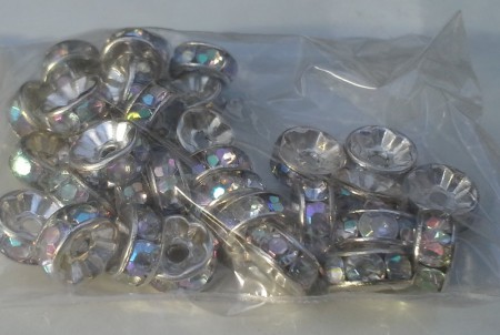 *Silver/ljusblå crystal rondeller. 8x3mm. 2st 1kr. 100st i lager