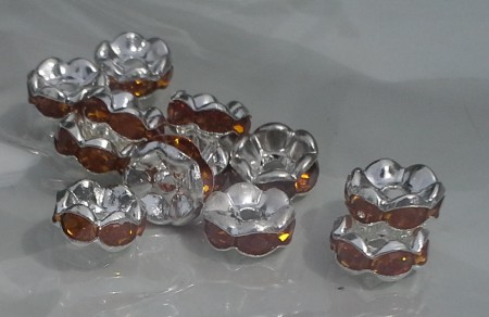 * artnr rop2,14 Rondeller 8x3mm. Färg se bild