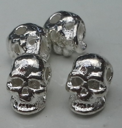 ¤artnr. öpd2e Metall silver dödskallar.5x7mm, tjocklek 5mm, hål 1mm. 