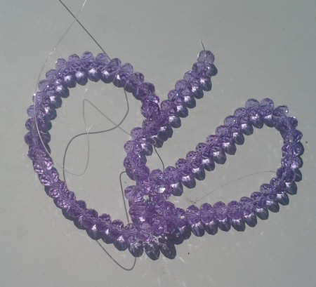 * artnr. rop10.1tab AB lyster. Lila crystal rondeller. 6x8mm.