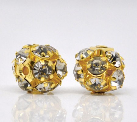 # Guldfärgade strassbollar 8-9mm